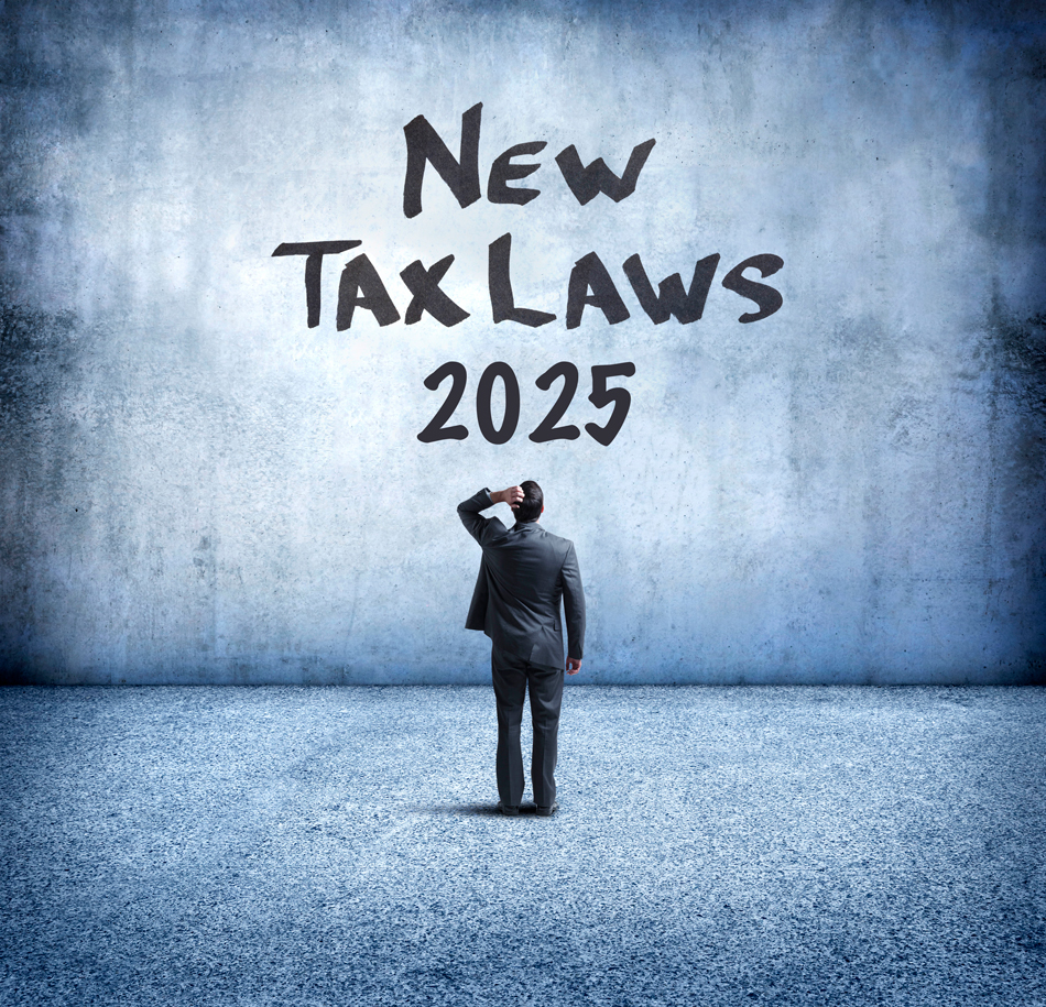 Man looking at a wall that reads New Tax Laws 2025